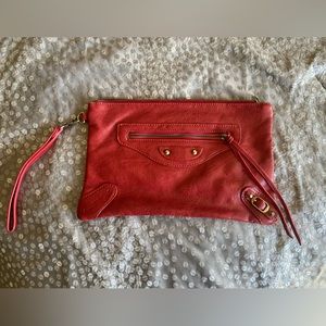 Red leather clutch